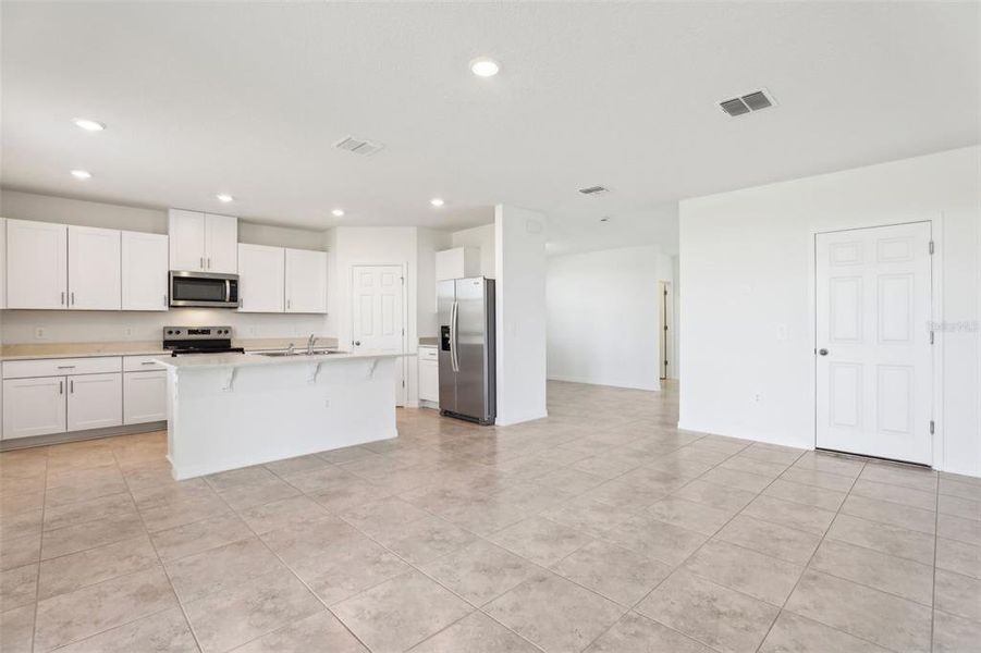 Furnished interior view inside a new home in Lake Deer Estates - Signature Series, Poinciana (Image 15). Furnished interior view inside a new home in Lake Deer Estates - Signature Series, Poinciana (Image 15).