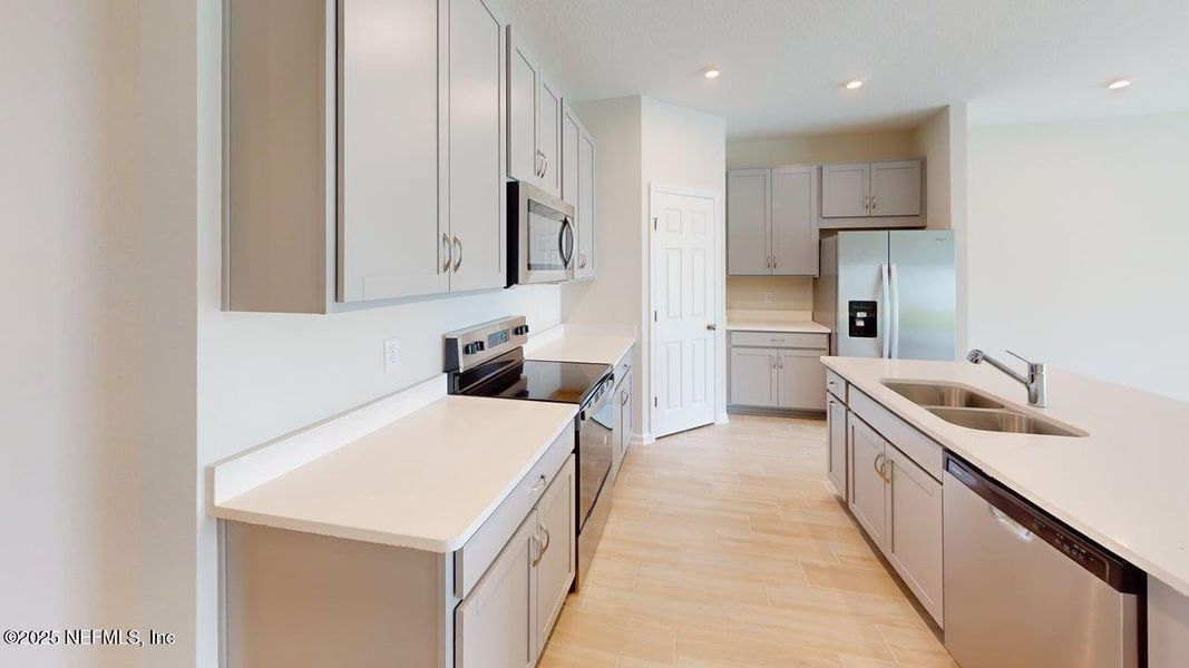 Furnished interior view inside a new home in Sandridge Hills, Green Cove Springs (Image 3). Furnished interior view inside a new home in Sandridge Hills, Green Cove Springs (Image 3).