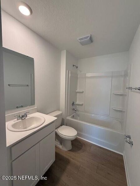 Furnished interior view inside a new home in Grand Reserve, Bunnell (Image 11).