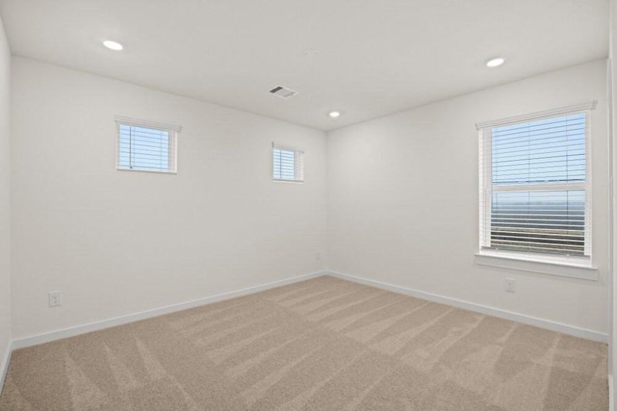 Spacious, unfurnished interior of a new home in Creekhaven, Iowa Colony (Image 23).
