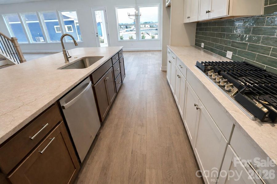 Gourmet Two Toned Kitchen with 5-Burner Gas Stove