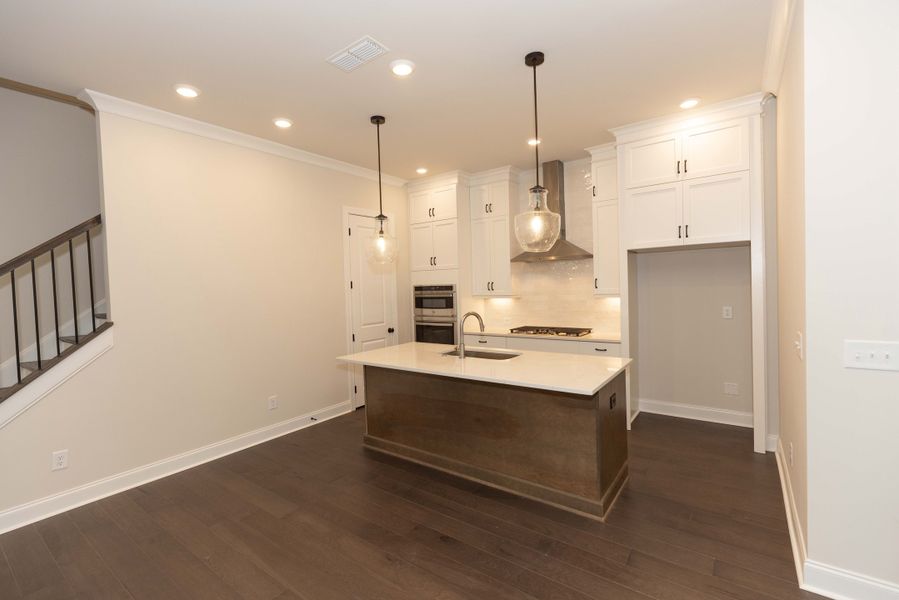 Representative furnished interior of a home built from the The Tensley by The Providence Group in Waterhaven, Cumming (Image 6).