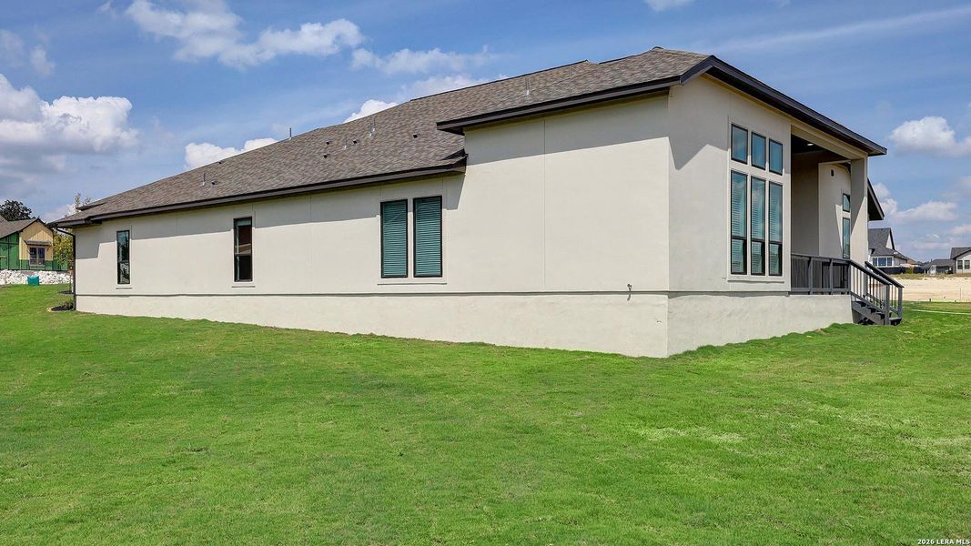 Exterior details and patio area of a home in George's Ranch, Boerne (Image 3).