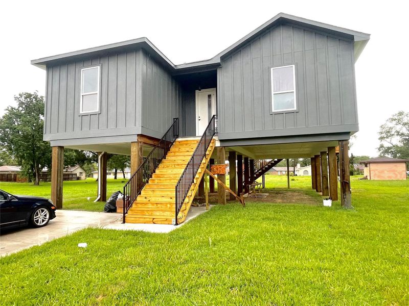 Front exterior of a new home in , Houston, TX, highlighting curb appeal (Image 1).