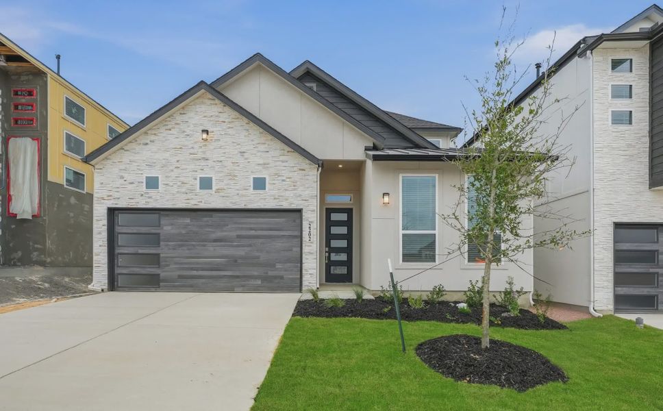 Representative exterior photo of a completed home built from the Talos by Chesmar Homes in Prominence Urban, San Antonio, TX (Image 17).