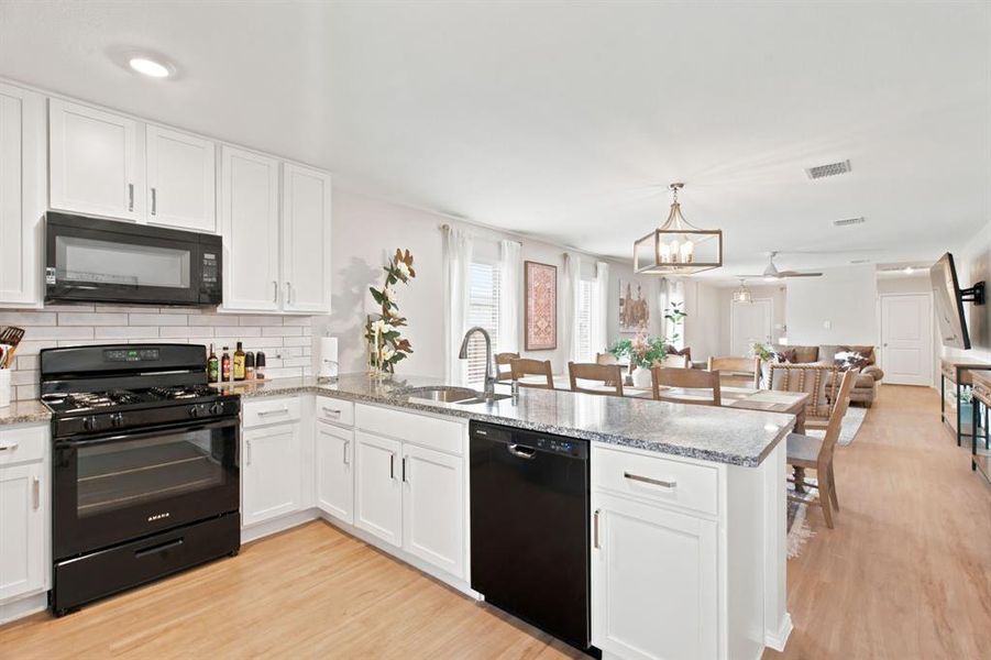 Large white bright kitchen of 1028 Naranjos Dr, Haslet TX in Rancho Canyon