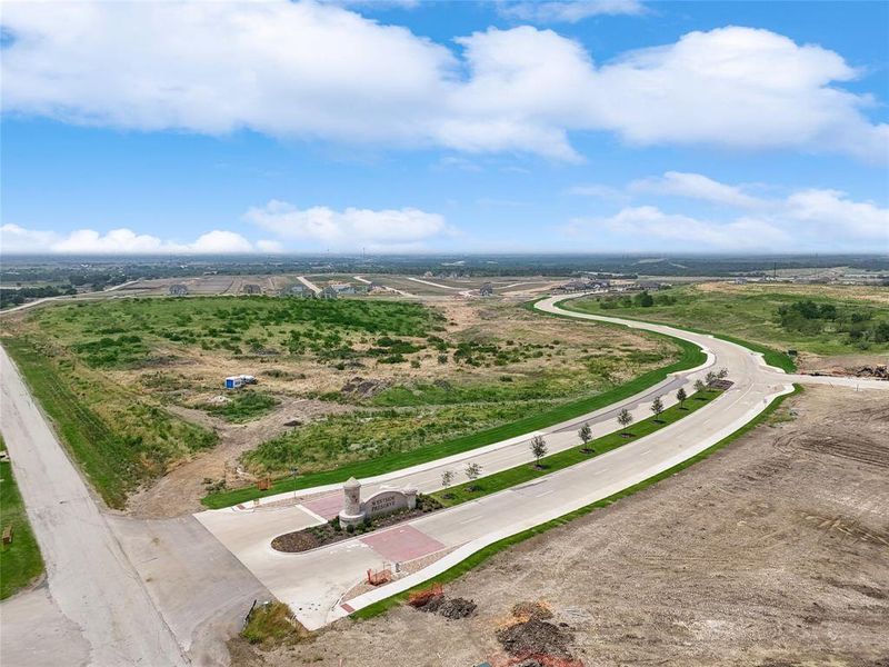 Birds eye view of property with a rural view