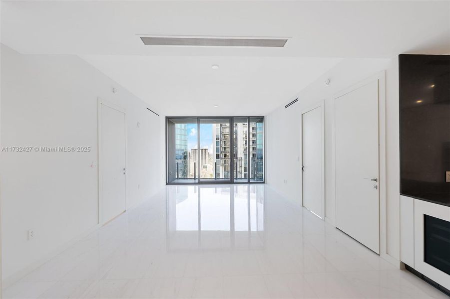 Spacious, unfurnished interior of a new home in Aston Martin Residences, Miami (Image 12). Spacious, unfurnished interior of a new home in Aston Martin Residences, Miami (Image 12).