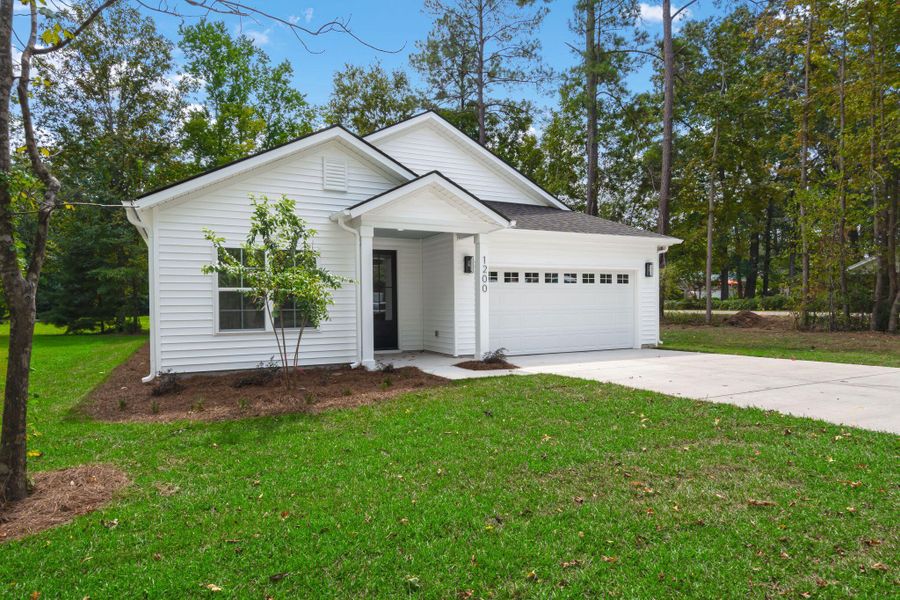 Front exterior of a new home in , Moncks Corner, SC, highlighting curb appeal (Image 22).