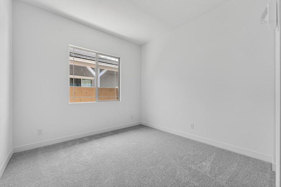 Spacious, unfurnished interior of a new home in Ellsworth Ranch, Queen Creek (Image 26).