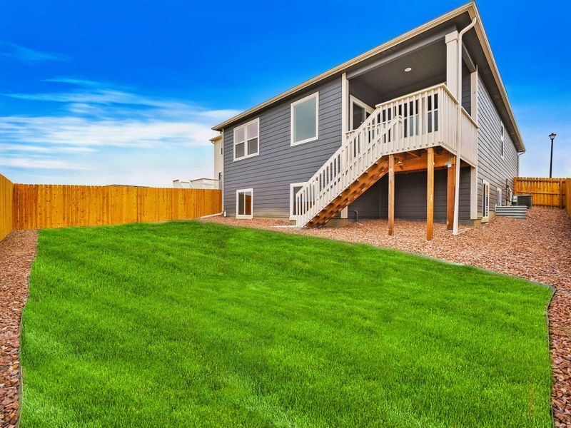 Exterior details and patio area of a home in Ridge at Lorson Ranch, Colorado Springs (Image 23).