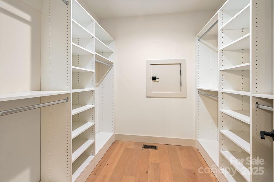 large walk in closet in lower level