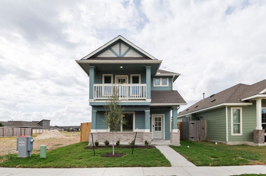Front exterior of a new home in Blanco Vista, San Marcos, TX, highlighting curb appeal (Image 1). Front exterior of a new home in Blanco Vista, San Marcos, TX, highlighting curb appeal (Image 1).