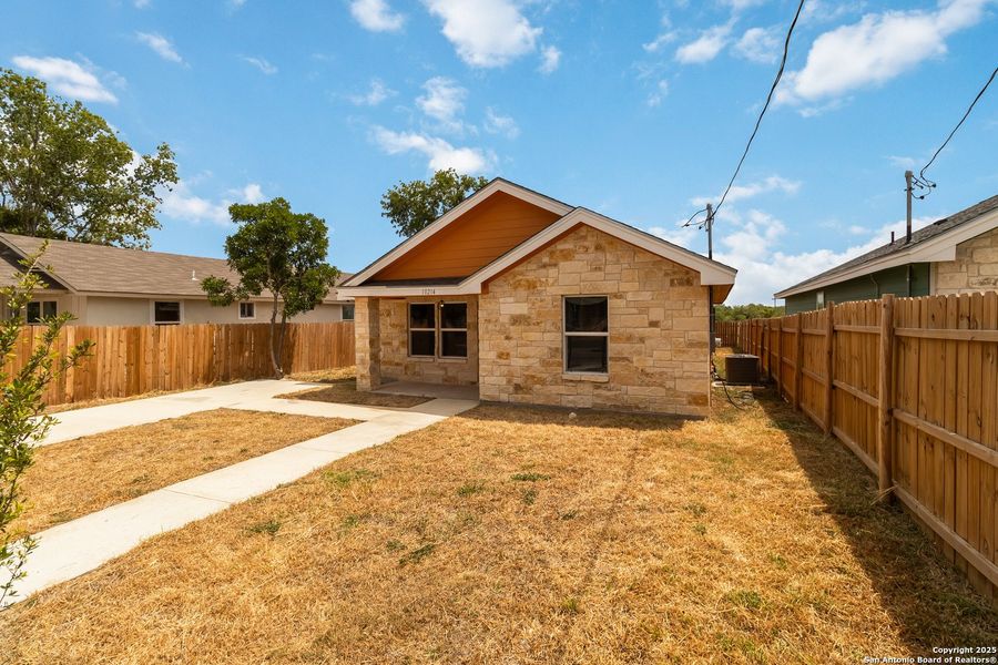 Front exterior of a new home in , San Antonio, TX, highlighting curb appeal (Image 16).