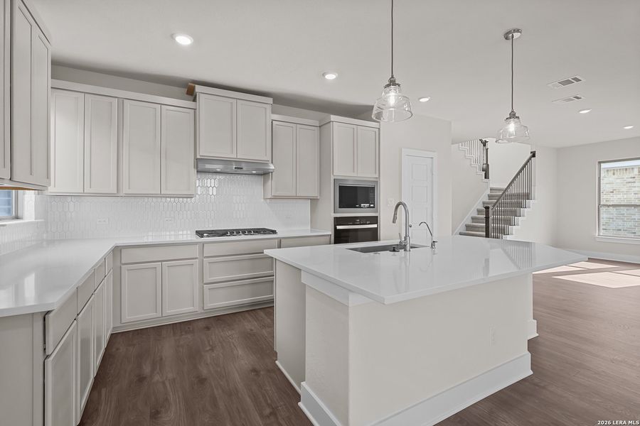 Furnished interior view inside a new home in Nopal Valley, San Antonio (Image 13).
