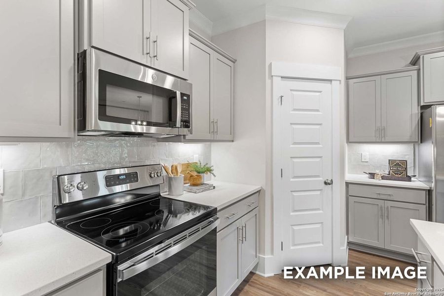 Furnished interior view inside a new home in Hickory Ridge, Elmendorf (Image 31).