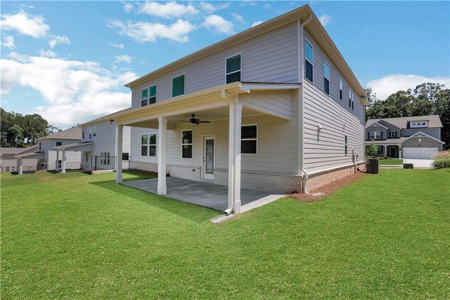Exterior details and patio area of a home in Bailey Fence, Dacula (Image 23).