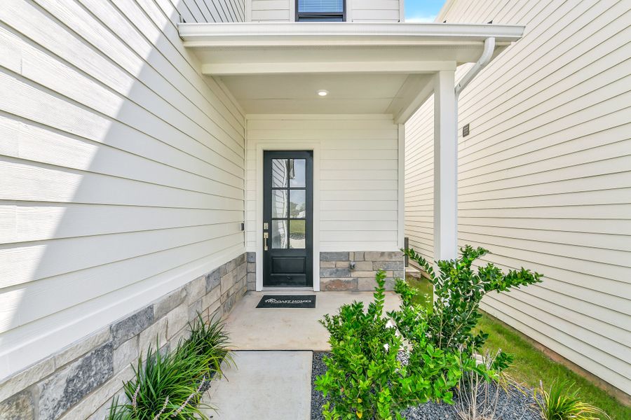 Exterior details and patio area of a home in Summer Place  35', Montgomery (Image 3).