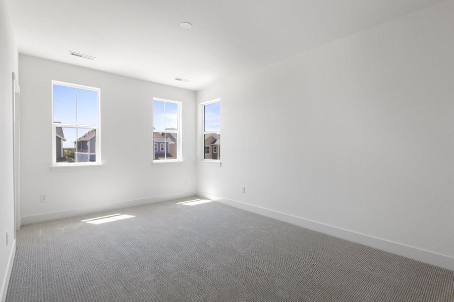 Representative unfurnished interior of a home built from the Journey Series - Varra by Brightland Homes in Dillon Pointe - Skyview, Broomfield (Image 17).