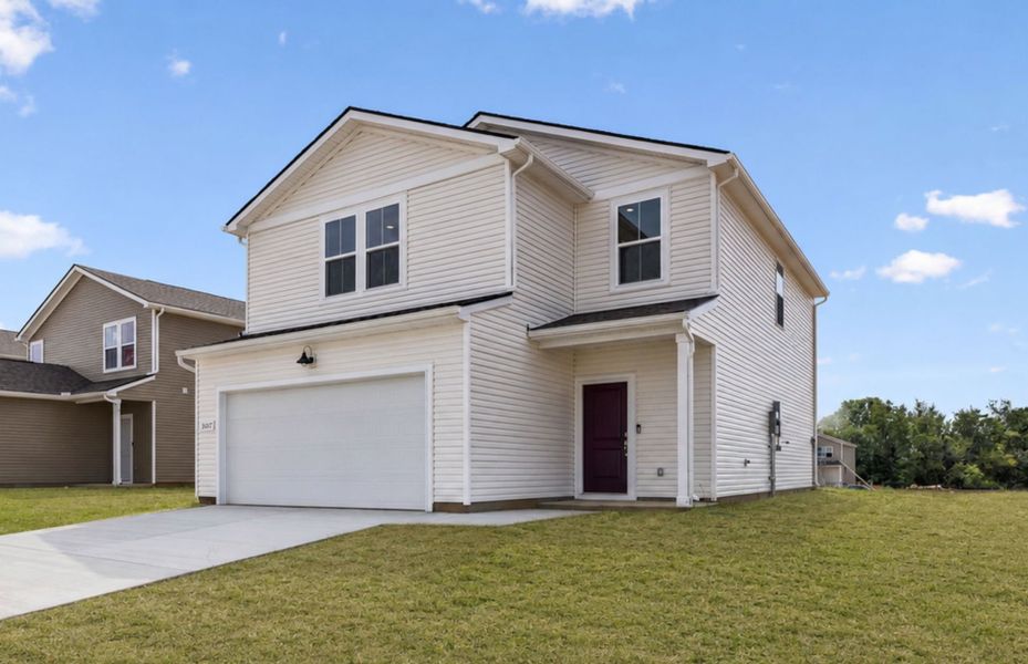 Front exterior of a new home in Highlands of Carter's Station, Columbia, TN, highlighting curb appeal (Image 20).