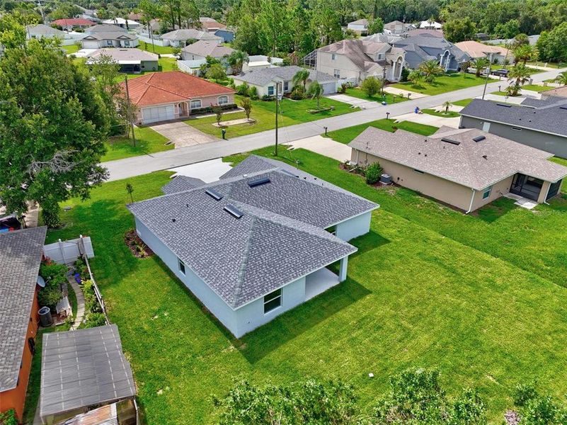 Front exterior of a new home in , Palm Coast, FL, highlighting curb appeal (Image 1).