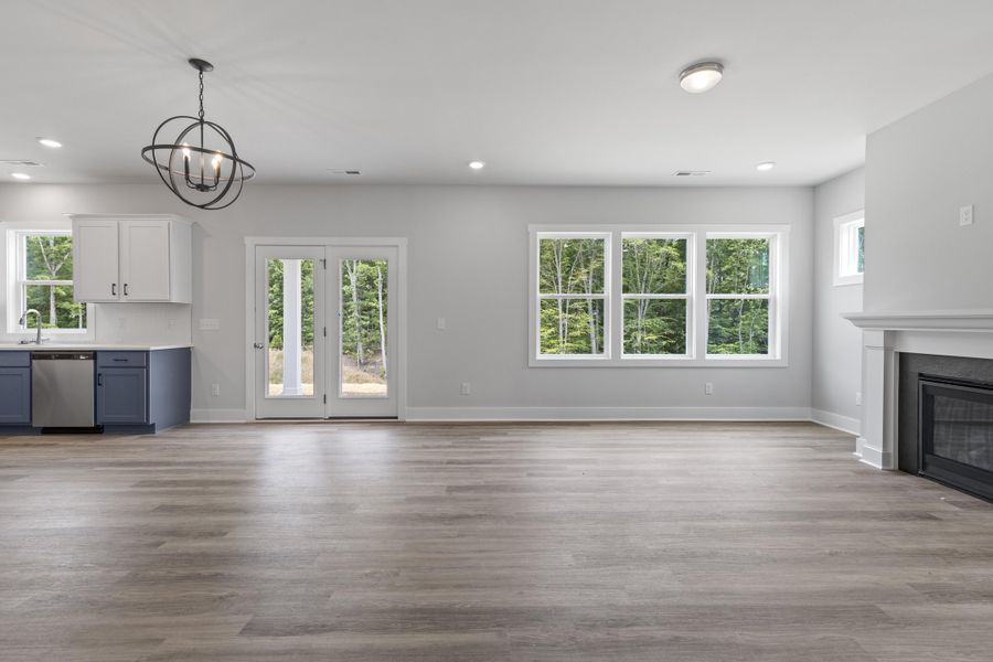 Representative unfurnished interior of a home built from the Blue Satin Sashes by Garman Homes in Spring Valley, Trinity (Image 9).