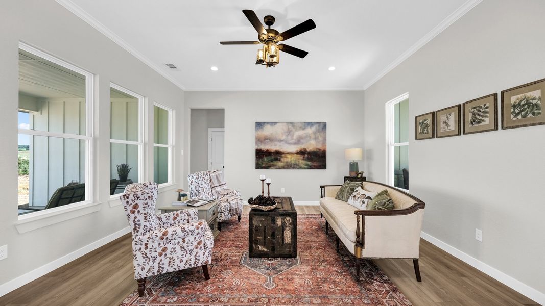 Representative furnished interior of a home built from the Loretta by Zeal Home Builders in Parallel Pastures, Poolville (Image 7).