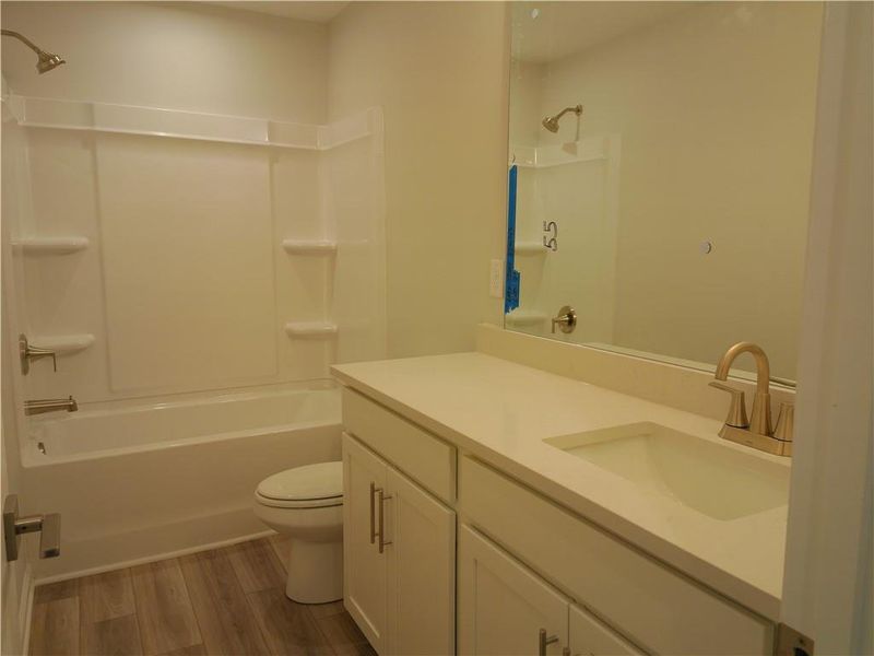 Furnished interior view inside a new home in Lake Shore, Winder (Image 6).