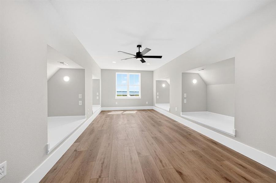 Ultimate destination for large families: Custom-built-in bunk room equipped with four distinct beds. Each nook features a private sconce light and dedicated electrical outlets. Ultimate destination for large families: Custom-built-in bunk room equipped with four distinct beds. Each nook features a private sconce light and dedicated electrical outlets.