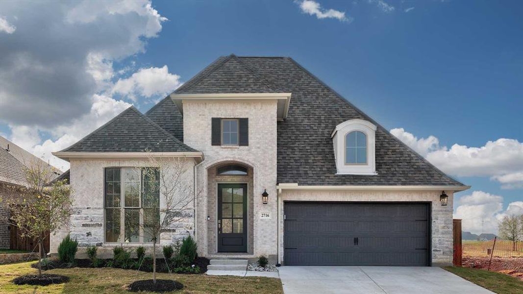 Front exterior of a new home in Devonshire 55', Forney, TX, highlighting curb appeal (Image 2).