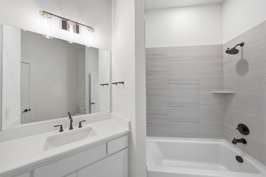 Furnished interior view inside a new home in Light Farms Graham/Reagan, Celina (Image 8).