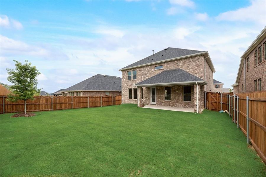 Front exterior of a new home in Villages of Hurricane Creek, Anna, TX, highlighting curb appeal (Image 20).