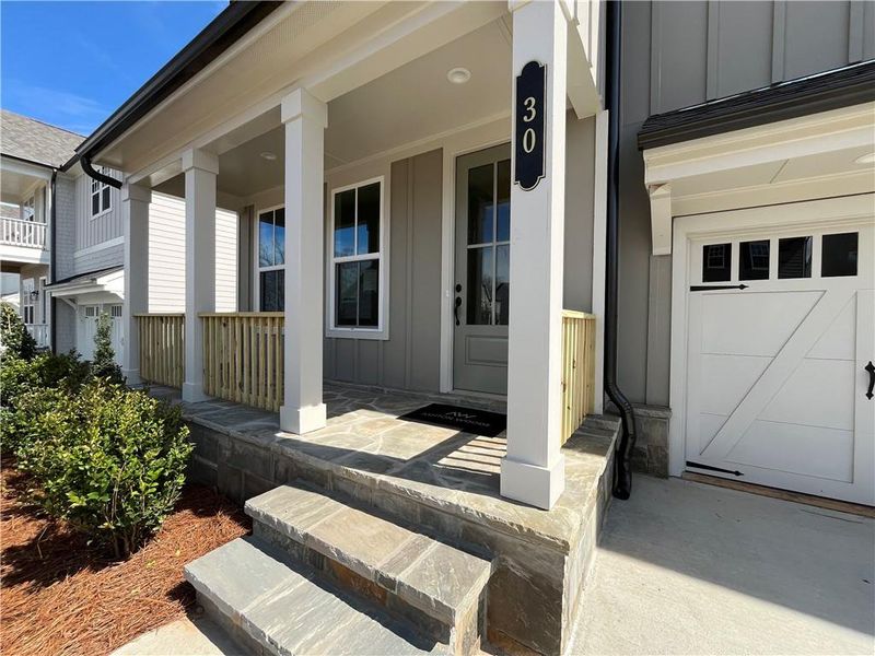 Exterior details and patio area of a home in East Harbor II at Chestatee, Dawsonville (Image 3).