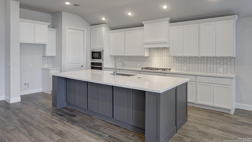 Furnished interior view inside a new home in Vida 50', San Antonio (Image 14).