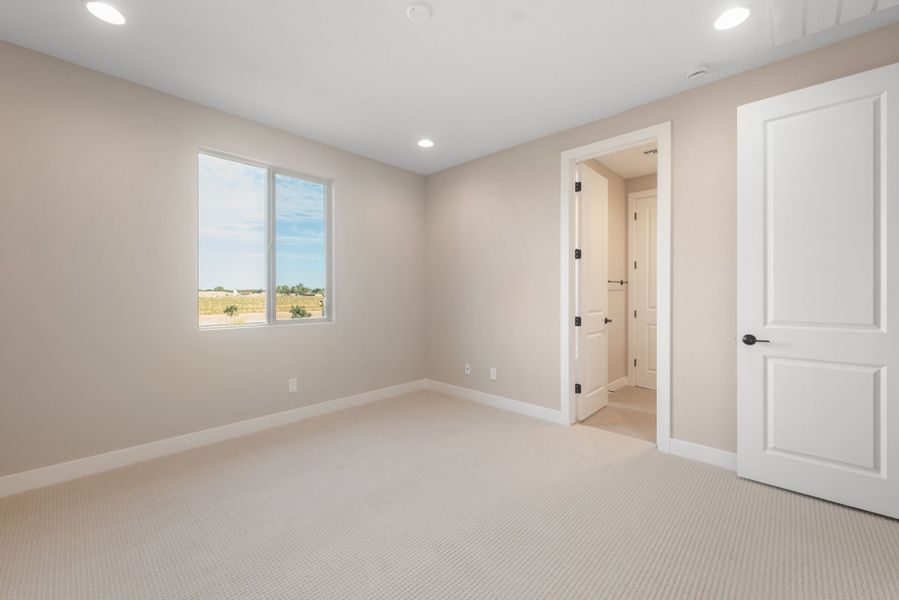 Spacious, unfurnished interior of a new home in Legado West, Queen Creek (Image 32).