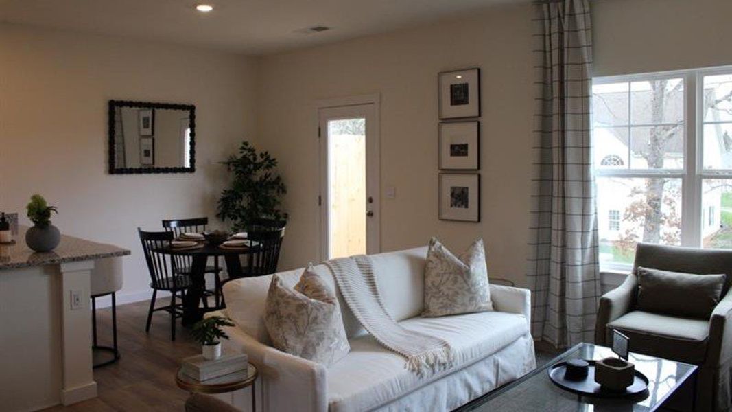 Representative furnished interior of a home built from the Altamont Townhome by D.R. Horton in Belcourt Landing, Cleveland (Image 5).