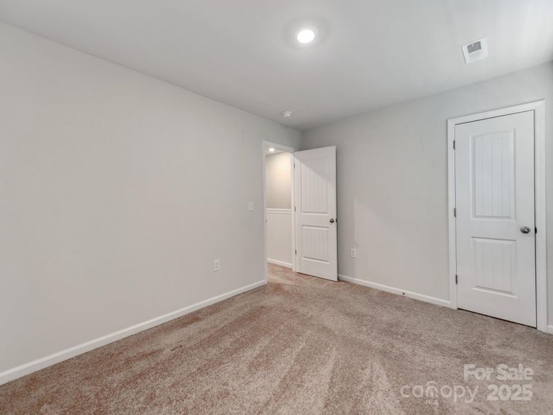 Spacious, unfurnished interior of a new home in McKee Creek Village, Charlotte (Image 26). Spacious, unfurnished interior of a new home in McKee Creek Village, Charlotte (Image 26).
