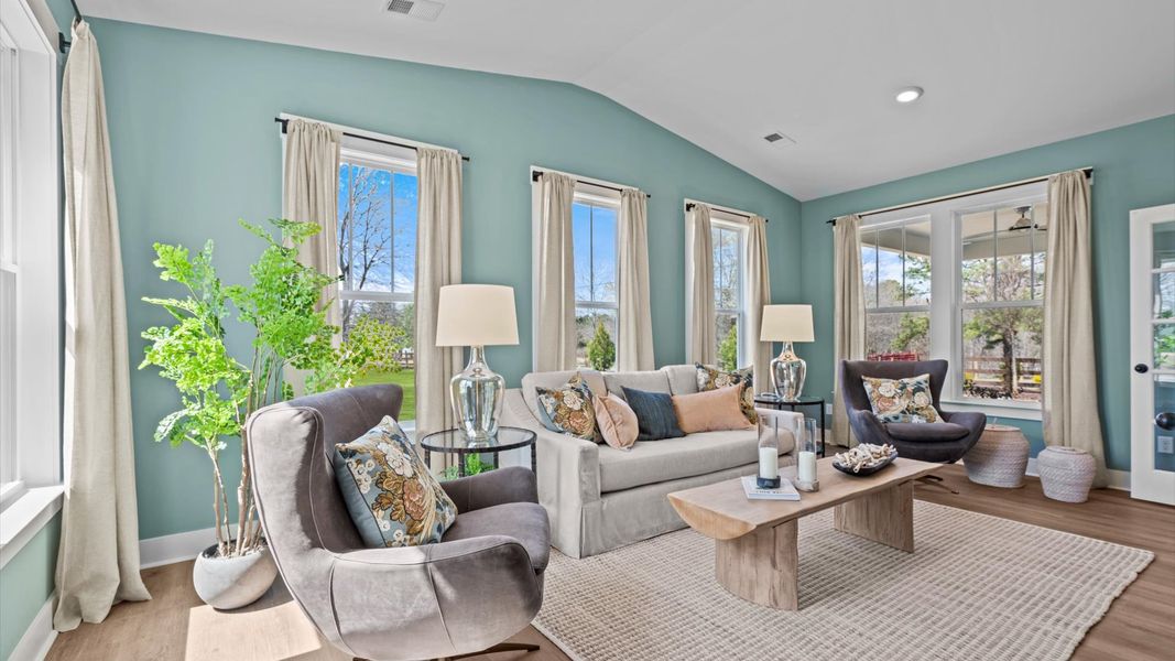 Vibrant and welcoming morning room anchored by clean lines, tasteful materials, and abundant light