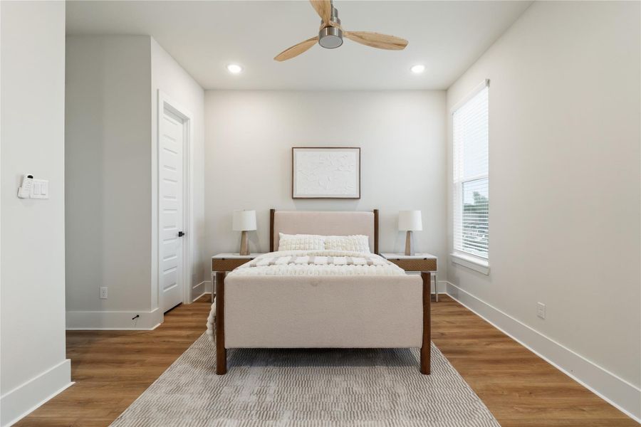 A well-sized secondary bedroom complete with a walk-in closet, providing functionality that goes beyond the typical secondary space. A well-sized secondary bedroom complete with a walk-in closet, providing functionality that goes beyond the typical secondary space.