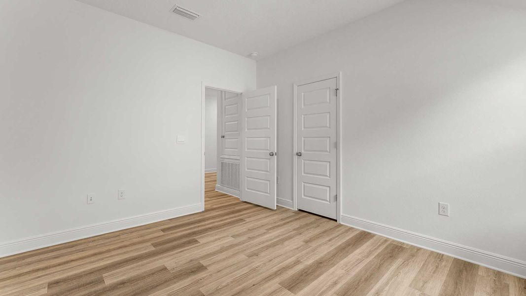 Spacious, unfurnished interior of a new home in Holley Grove at Peach Creek, Santa Rosa Beach (Image 20).