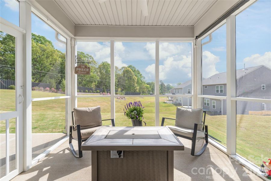 This screened in patio is just off the dining room. Unwind at the end of the day, enjoy morning coffee, entertain with friends