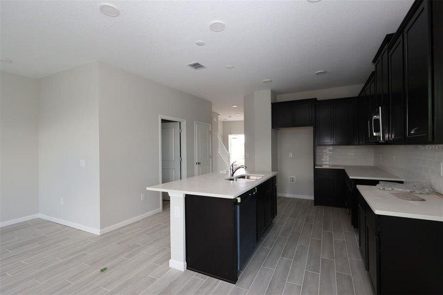 Furnished interior view inside a new home in Tribute at Ovation, Winter Garden (Image 14).