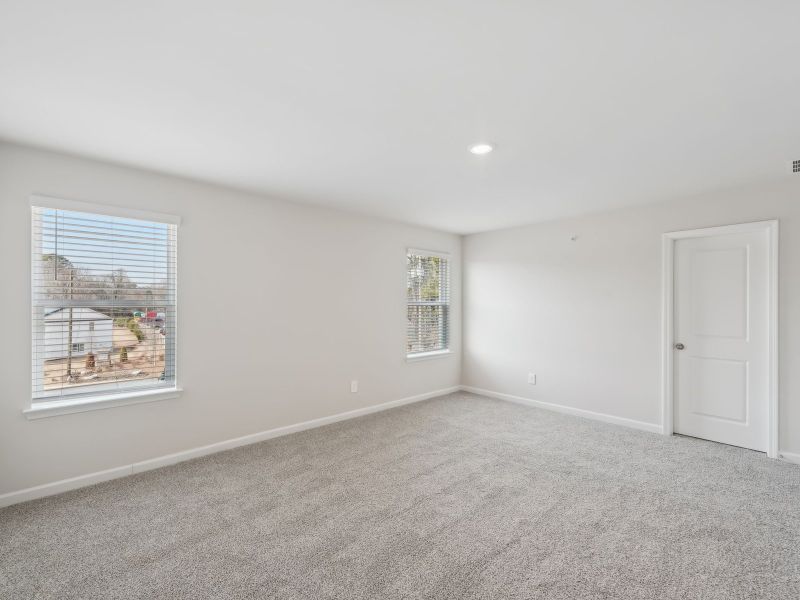 Spacious, unfurnished interior of a new home in Brooks Lake, Loganville (Image 20).