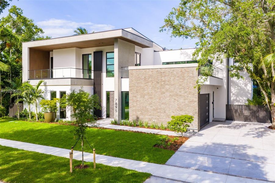 Front exterior of a new home in , Miami, FL, highlighting curb appeal (Image 2). Front exterior of a new home in , Miami, FL, highlighting curb appeal (Image 2).