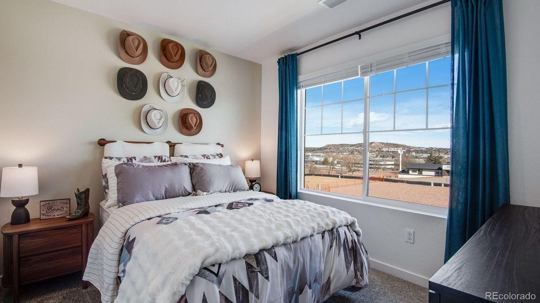 Furnished interior view inside a new home in The Ridge at Lorson Ranch, Colorado Springs (Image 26).