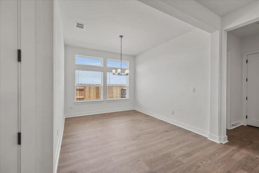 Representative unfurnished interior of a home built from the Courtney by Chesmar Homes in 6 Creeks, Kyle (Image 11).
