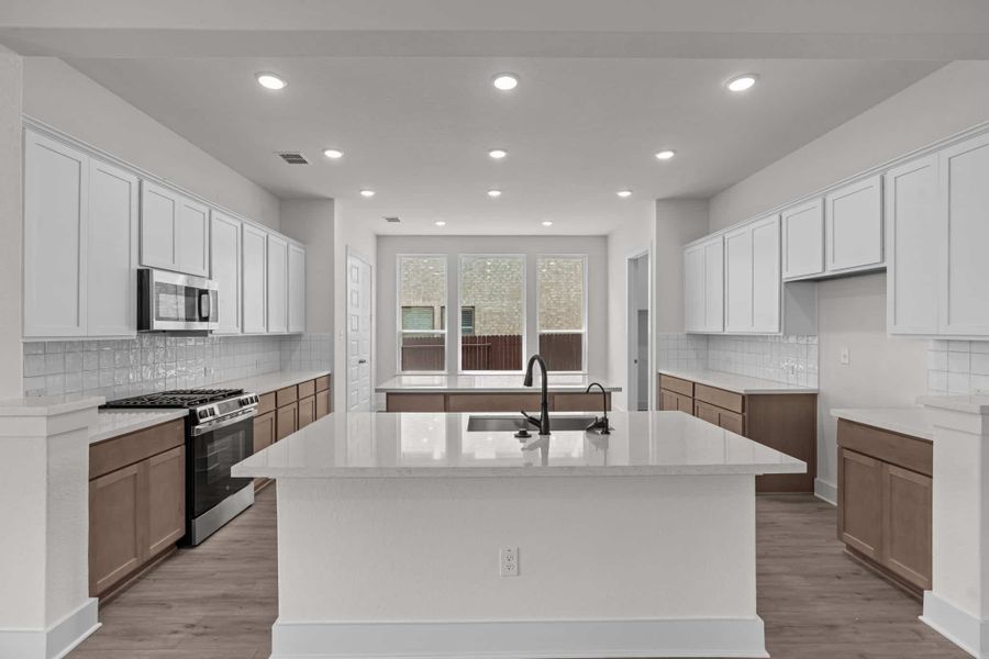 Representative furnished interior of a home built from the Maddie by Chesmar Homes in Stillwater Ranch, San Antonio (Image 3).