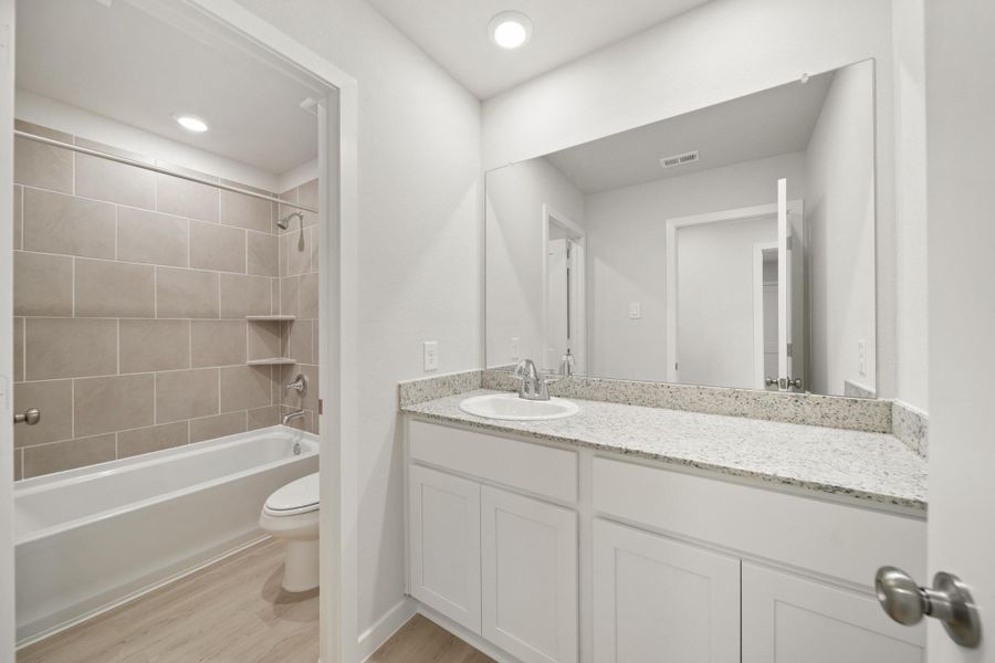 Furnished interior view inside a new home in Lexington Heights, Willis (Image 8). Furnished interior view inside a new home in Lexington Heights, Willis (Image 8).