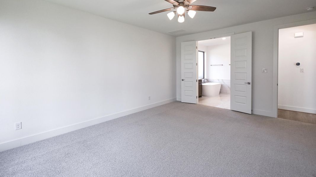 Spacious, unfurnished interior of a new home in Juniper Springs, Lockhart (Image 31).