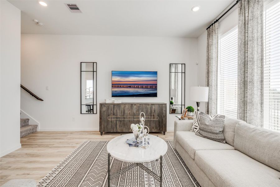 Furnished interior view inside a new home in Bridgeland, Cypress (Image 14).